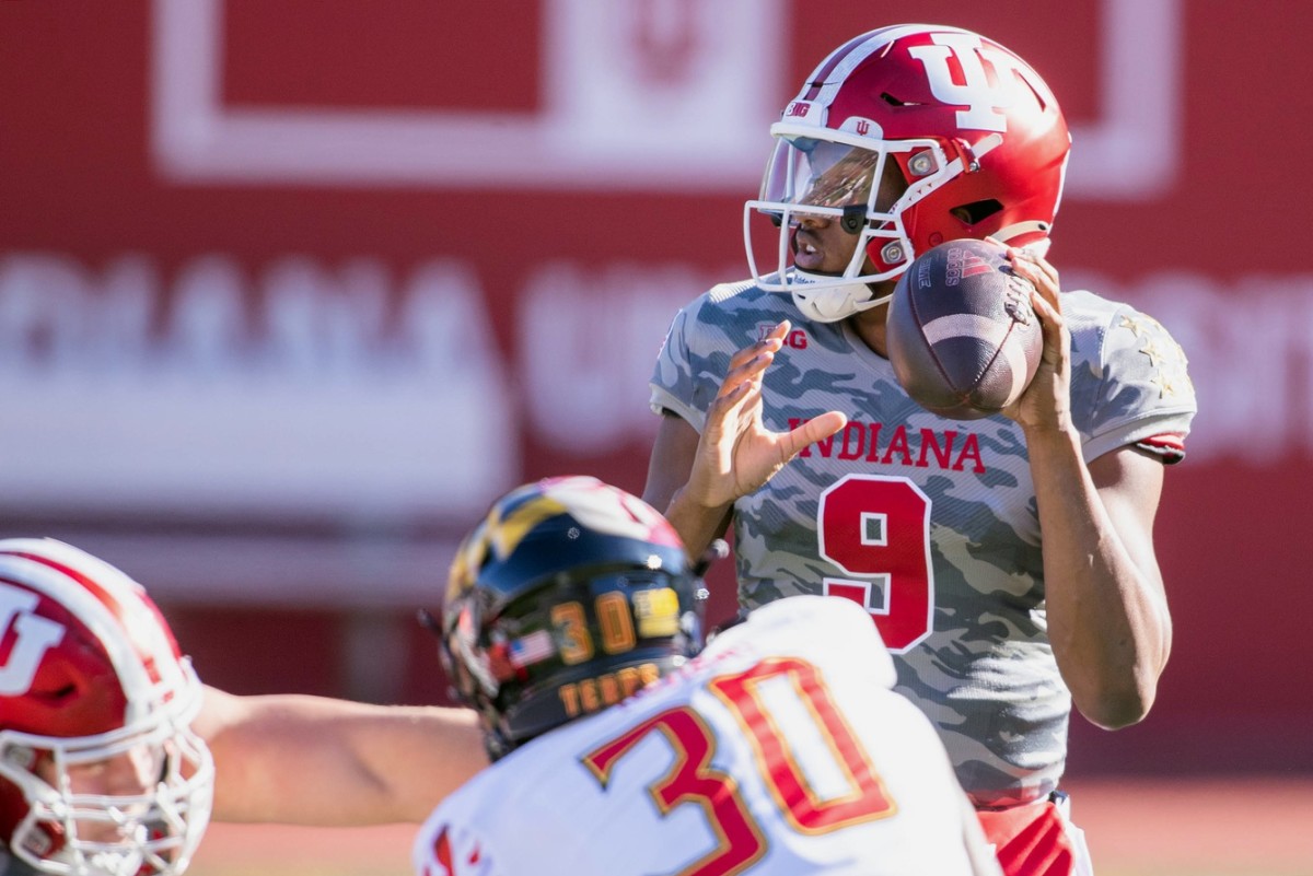 Michael Penix Jr. looks for a receiver against Maryland.