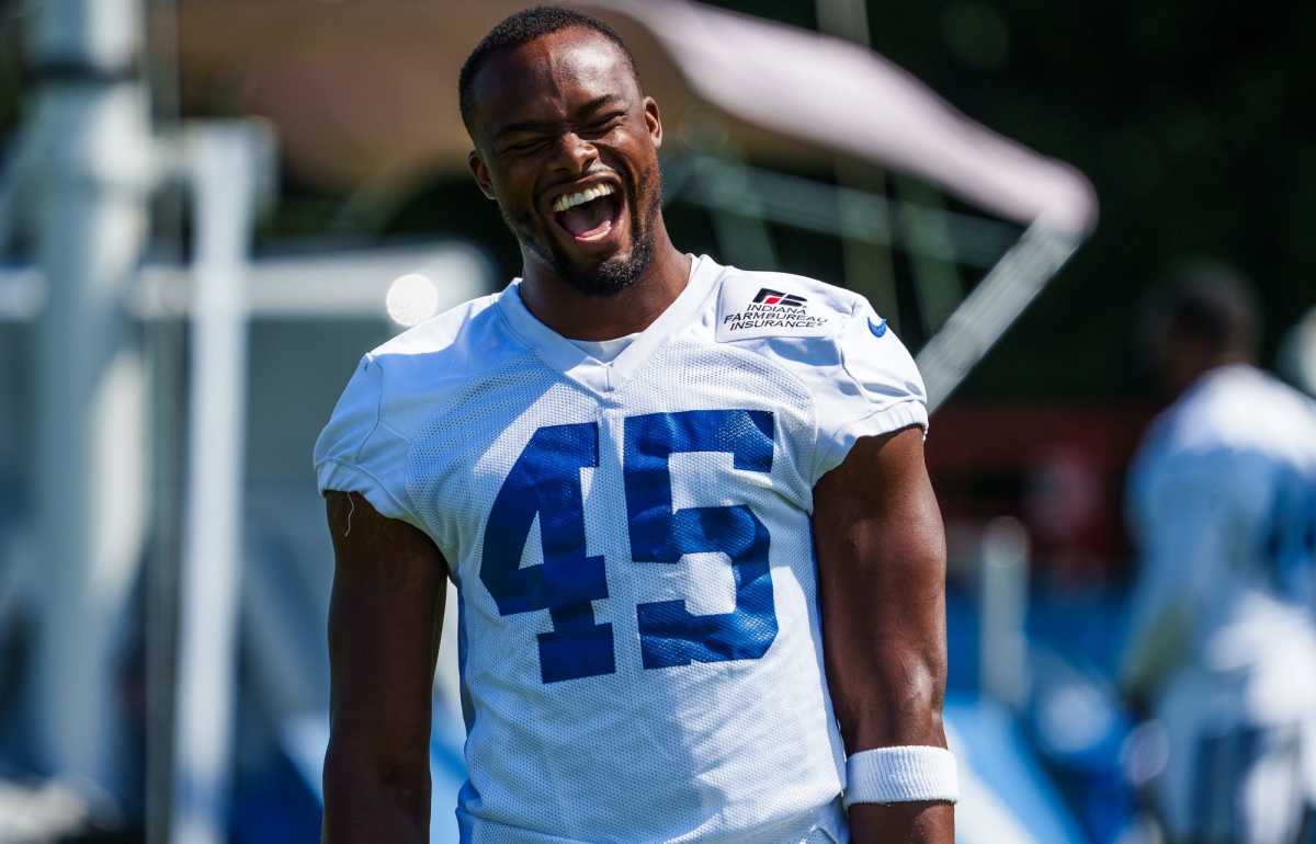 August 24, 2019: Indianapolis Colts linebacker Ben Banogu (52) and Chicago  Bears offensive lineman T.J. Clemmings (79) battle at the line of scrimmage  during NFL football preseason game action between the Chicago