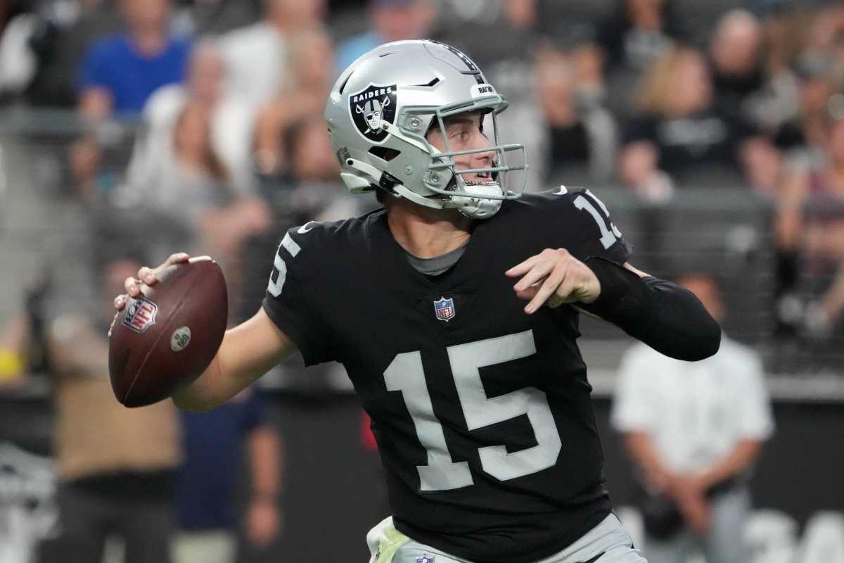 Las Vegas Raiders quarterback Chase Garbers #14 plays during a pre