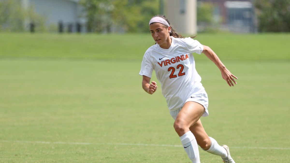 Virginia junior midfielder Lia Godfrey dribbles the ball during UVA's win over Fairleigh Dickinson.