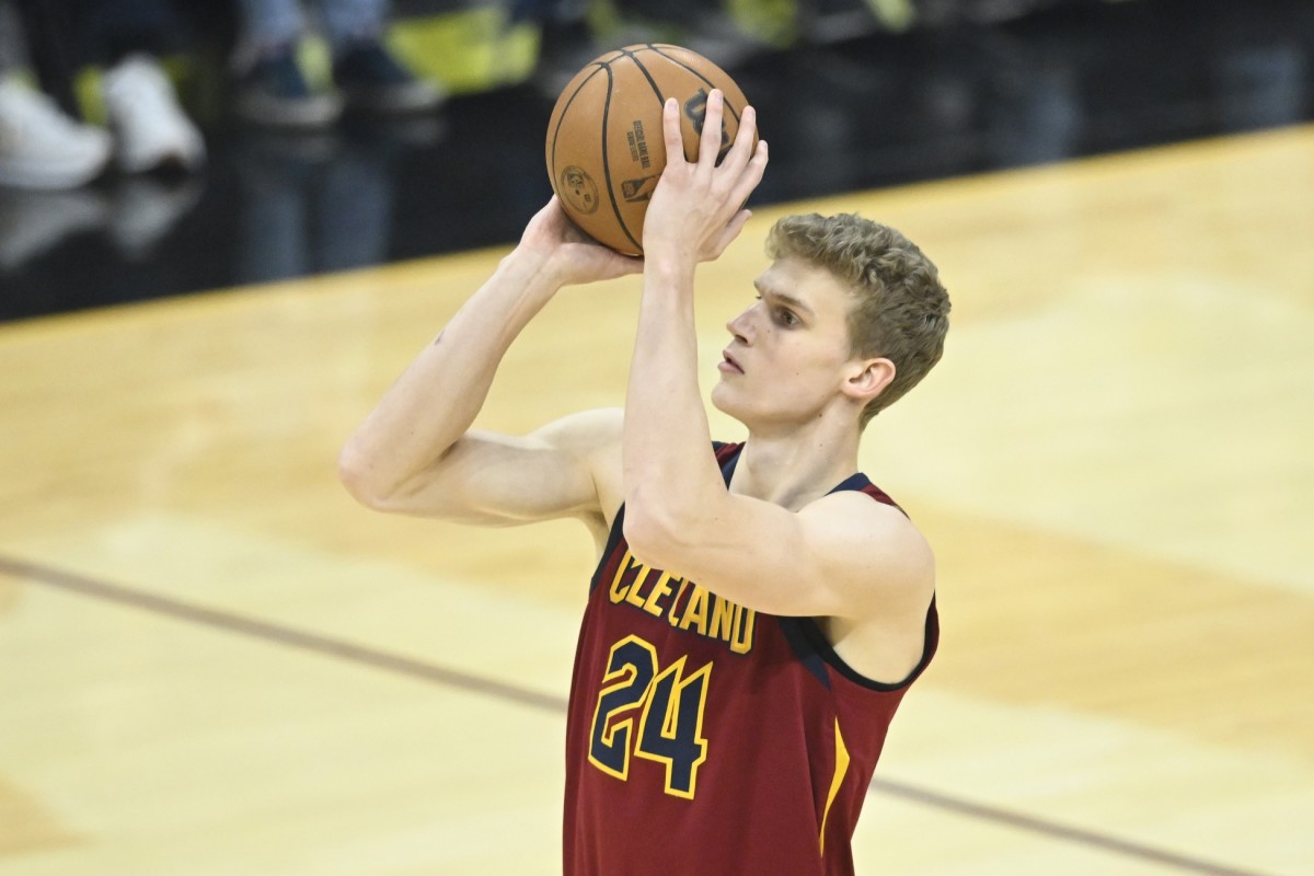 Cleveland Cavaliers forward Lauri Markkanen (24) shoots a three-point basket in the first quarter against the Milwaukee Bucks at Rocket Mortgage FieldHouse.