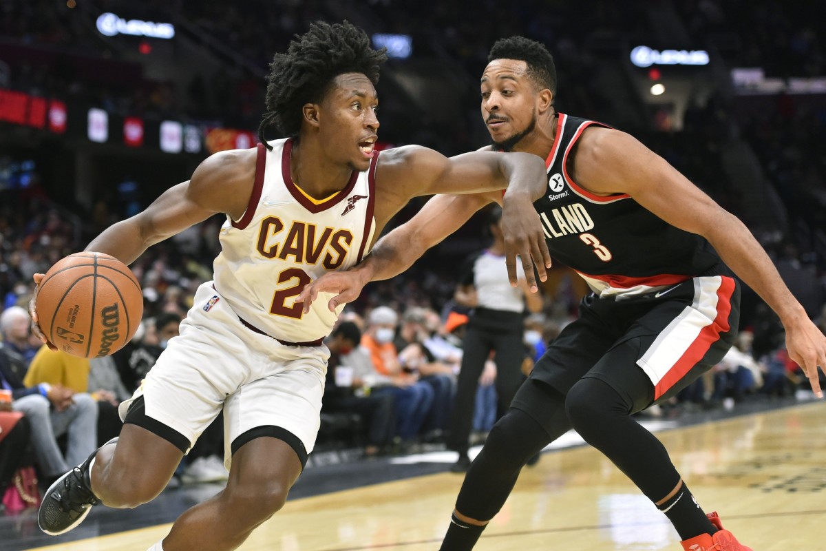 Portland Trail Blazers guard CJ McCollum (3) defends Cleveland Cavaliers guard Collin Sexton (2) in the third quarter at Rocket Mortgage FieldHouse.