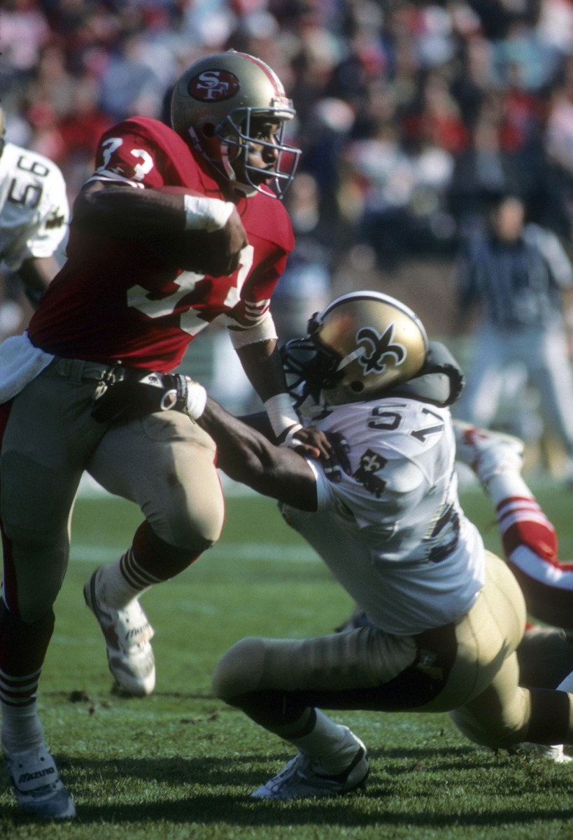 FILE PHOTO; San Francisco 49ers running back Roger Craig (33) in action against New Orleans Saints linebacker Rickey Jackson (57). Mandatory Credit: Malcolm Emmons-USA TODAY Sports