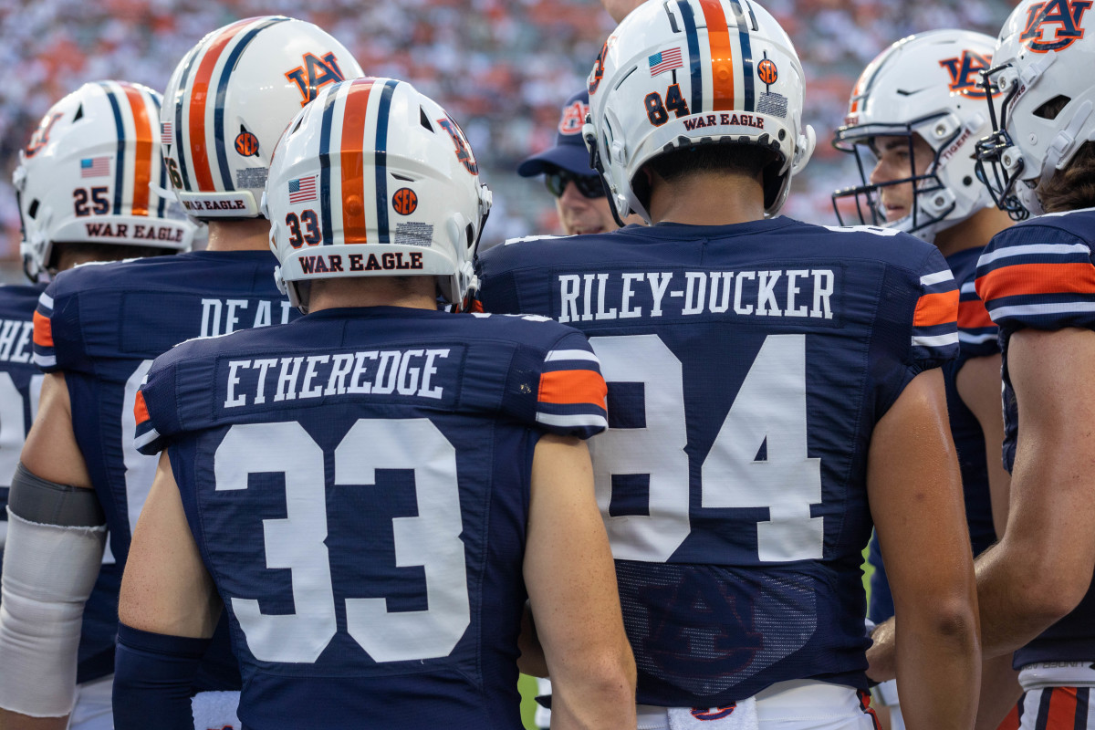 Cameron Etheridge, Micah Riley Ducker, and Luke Deal before Auburn takes on the Mercer Bears.