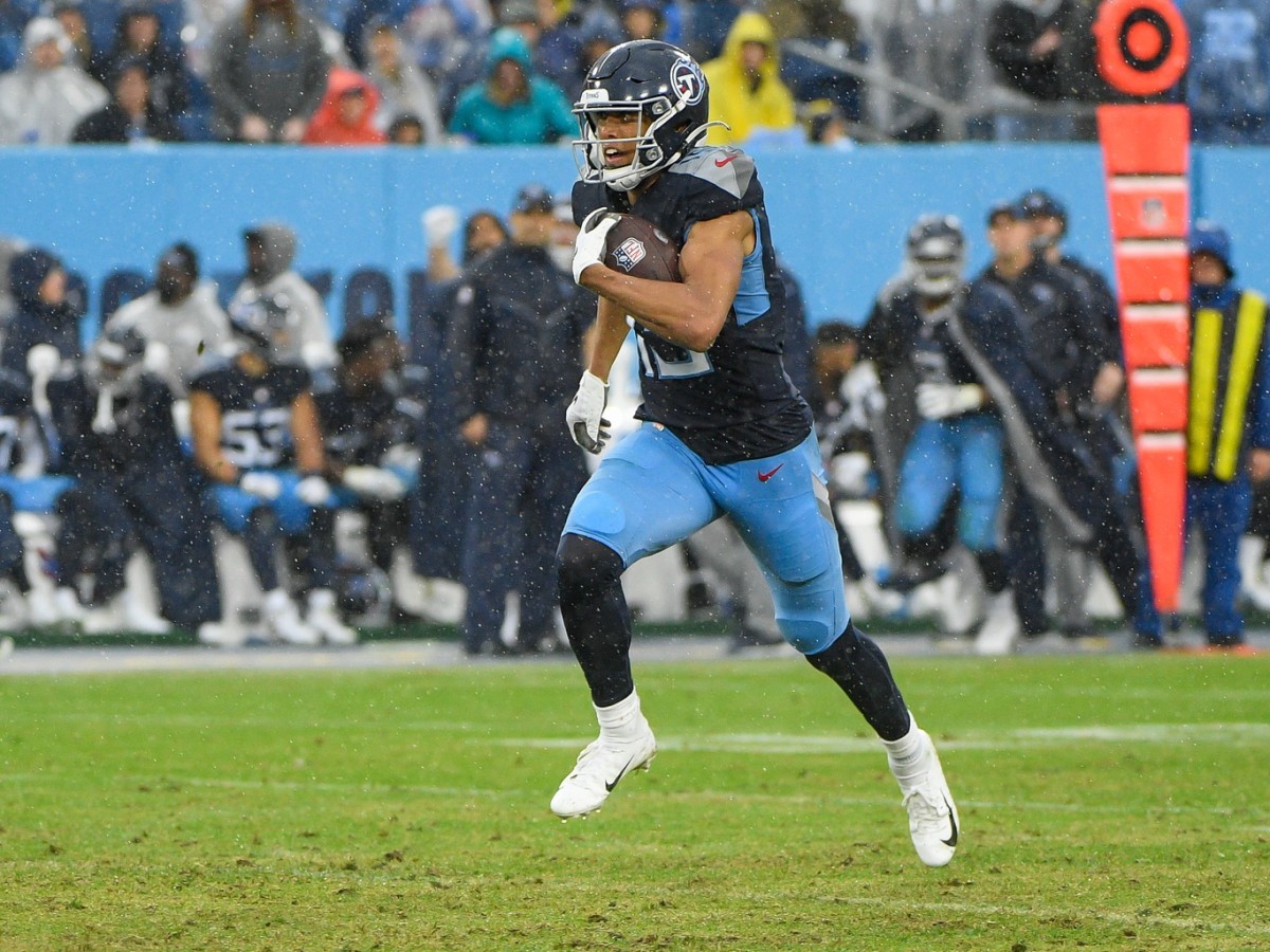 Tennessee Titans wide receiver Nick Westbrook-Ikhine (15) runs the ball against the Houston Texans during the second half at Nissan Stadium.