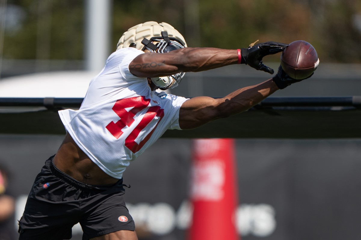 San Francisco 49ers linebacker Marcelino McCrary-Ball (40) makes a catch during training camp at the SAP Performance Facility near Levi Stadium.