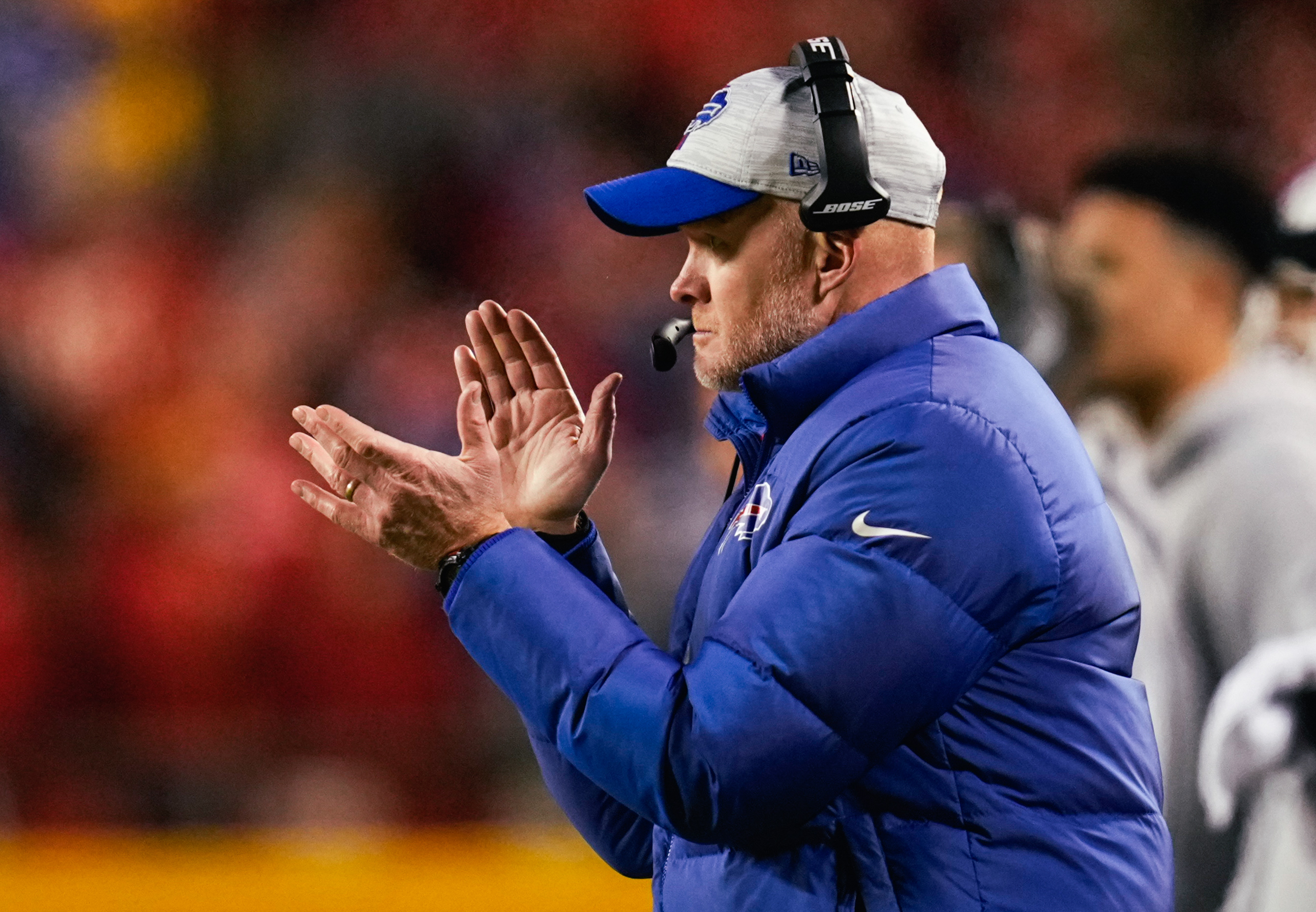 Buffalo Bills coach Sean McDermott clapping on the sidelines during a game.