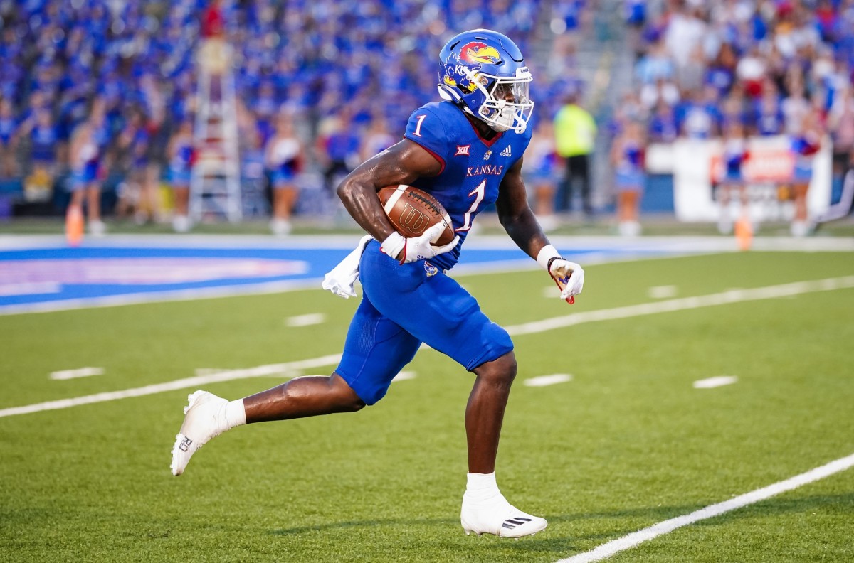 Sep 2, 2022; Lawrence, Kansas, USA; Kansas Jayhawks safety Kenny Logan Jr. (1) returns a kickoff against the Tennessee Tech Golden Eagles during the first half at David Booth Kansas Memorial Stadium.