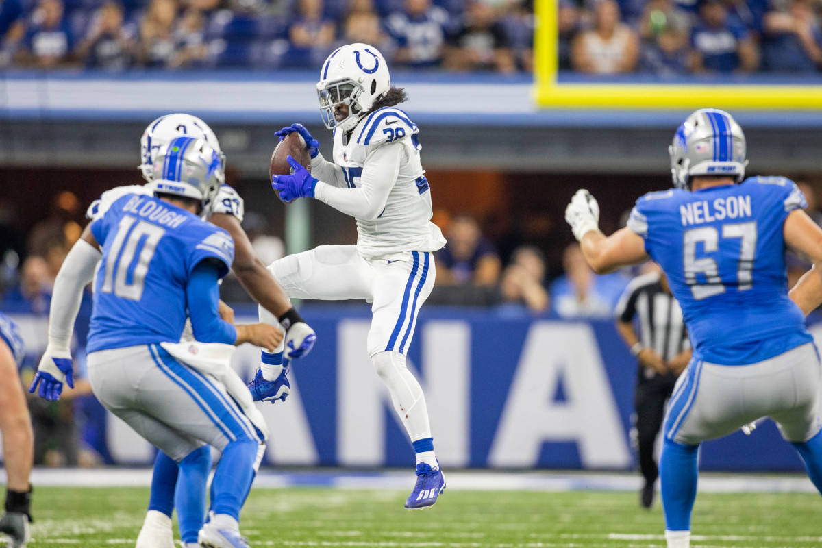 Aug 20, 2022; Indianapolis, Indiana, USA; Indianapolis Colts cornerback Tony Brown (38) intercepts the ball in the second quarter against the Detroit Lions at Lucas Oil Stadium.