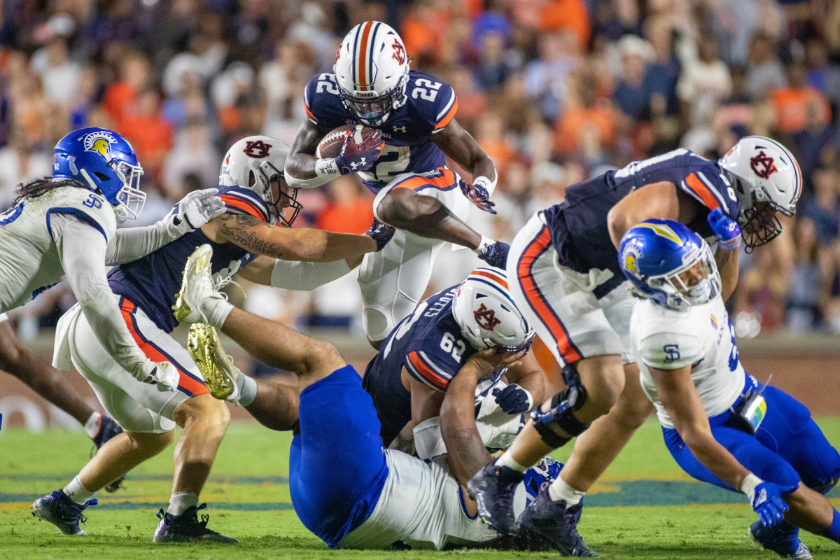 Auburn Tigers running back Damari Alston (22) goes airborne during the San Jose State vs Auburn game on Saturday, Sept. 10, 2022.