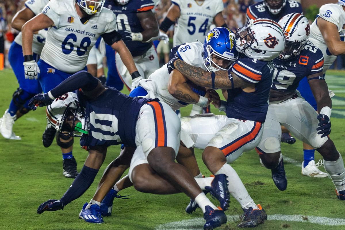 San Jose State Spartans quarterback Chevan Cordeiro (2)is met by Auburn Tigers safety Donovan Kaufman (1) during the San Jose State vs Auburn game on Saturday, Sept. 10, 2022.