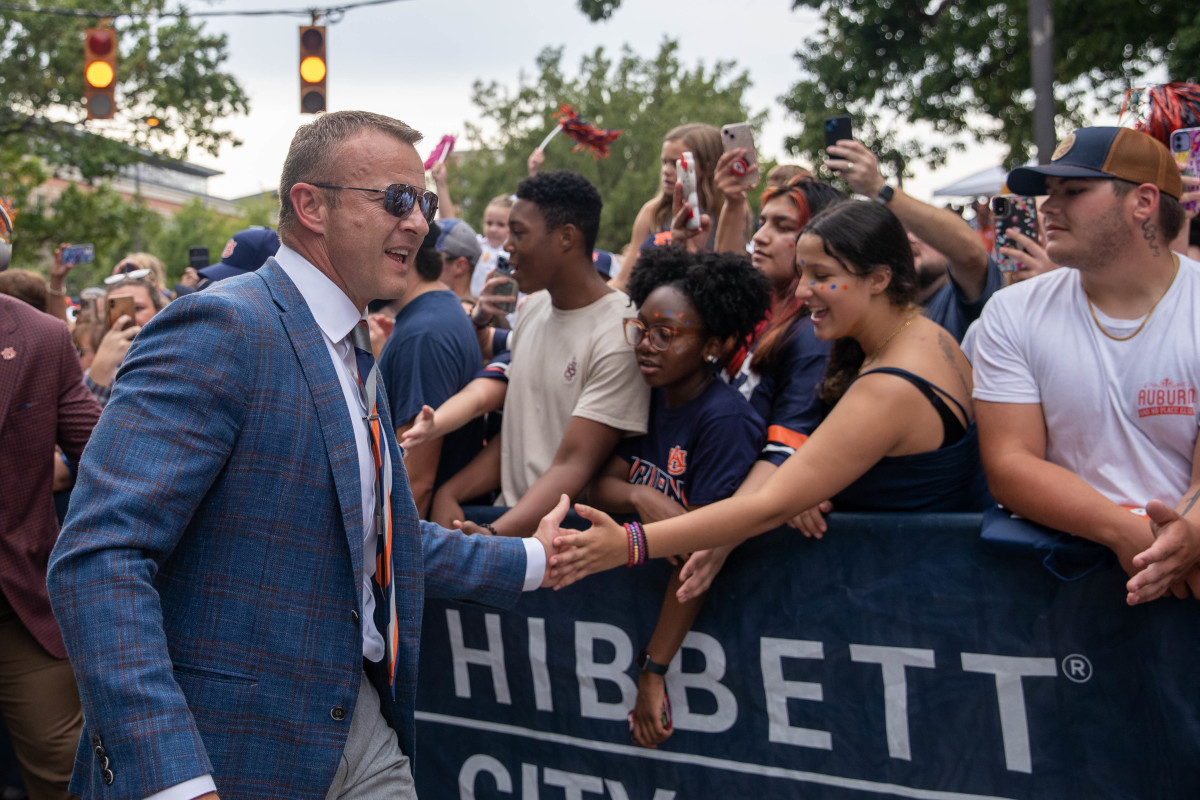 Auburn Tigers head coach Bryan Harsin greets fans along the Tiger Walk trail prior to the San Jose State vs Auburn game on Saturday, Sept. 10, 2022.