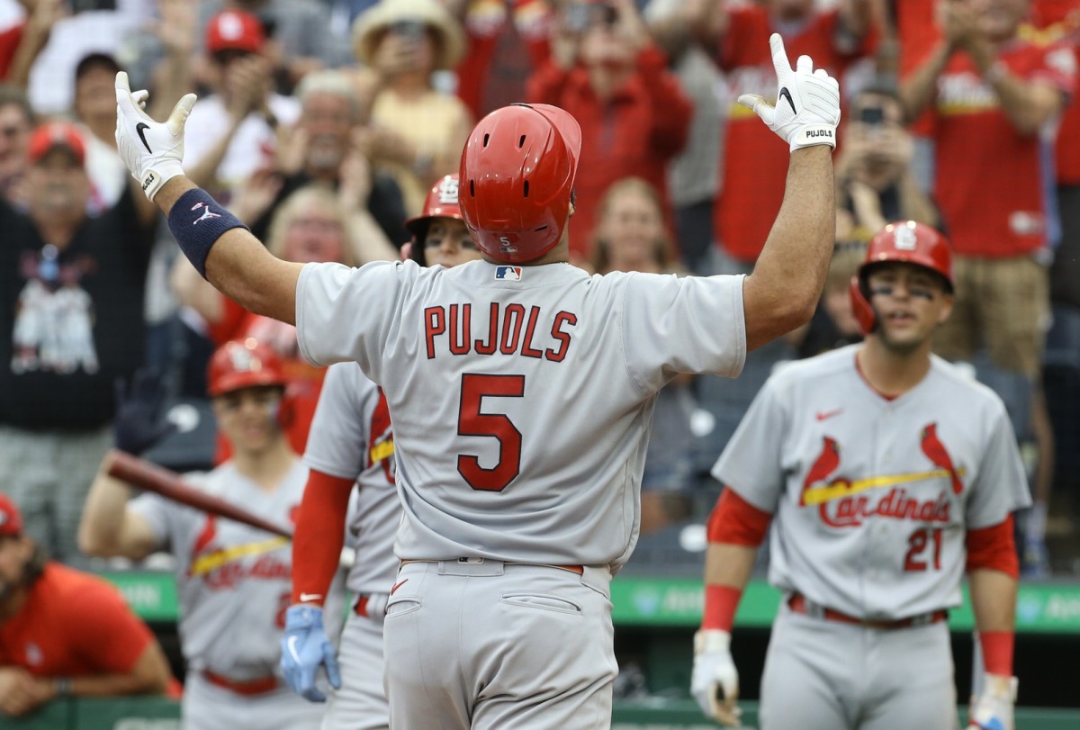 Pujols makes history again! 697 one day after 696
