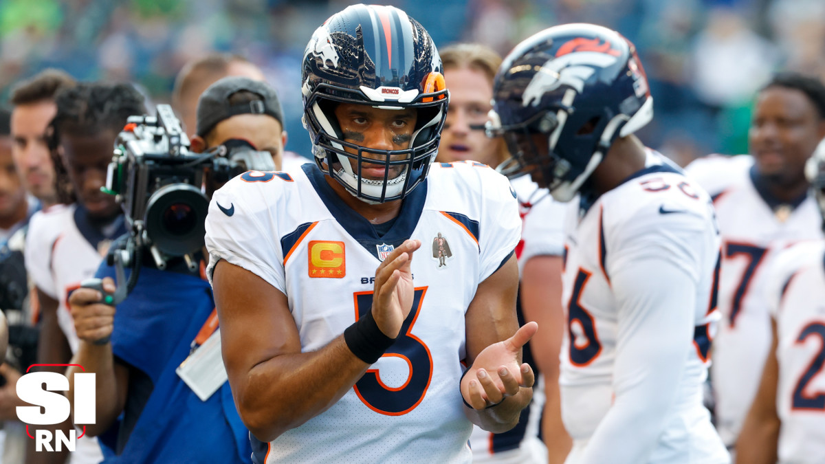 Broncos Russell Wilson greets some Seahawks, 1st fans in boo