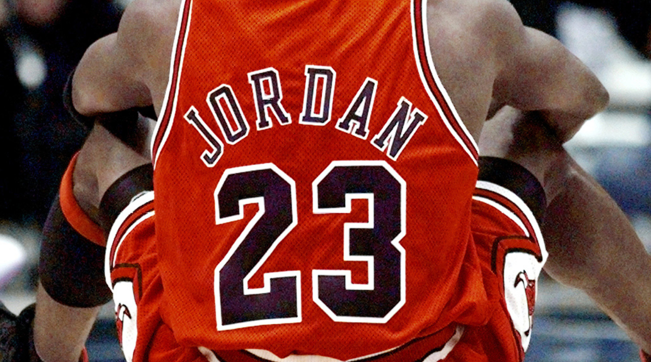 Michael Jordan's game-worn 1998 Air Jordans sell at auction for record  $2.24 million - ABC News