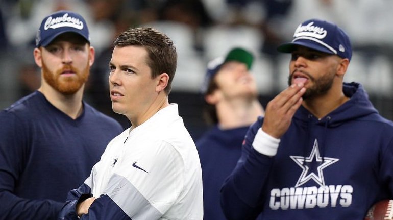 Dallas Cowboys head coach Mike McCarthy, left, and offensive coordinator  Kellen Moore, right watch from the sidelines during an NFL Football game  against the Houston Texans in Arlington, Texas, Saturday, Aug. 21