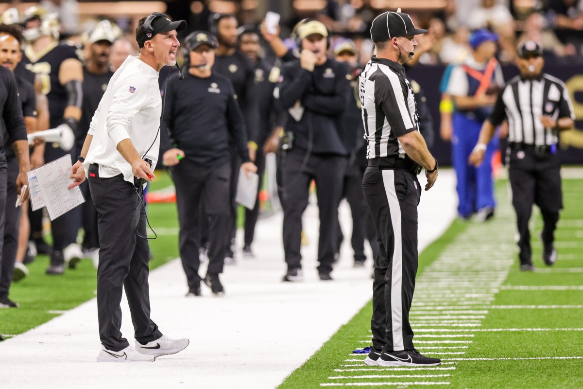 Dennis Allen and Pete Carmichael