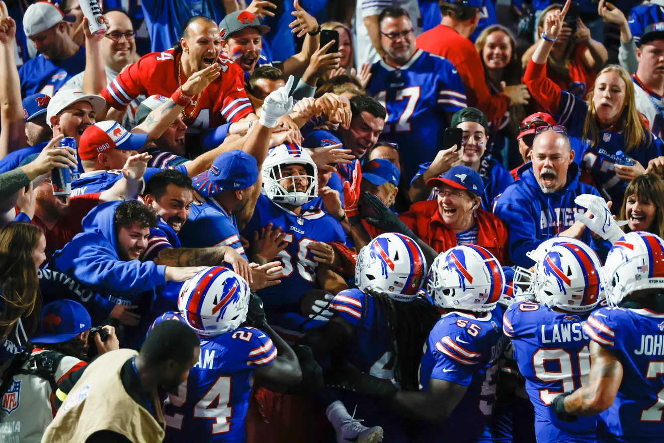 Buffalo Bills safety Micah Hyde celebrates after running an interception  back for a touchdown d …