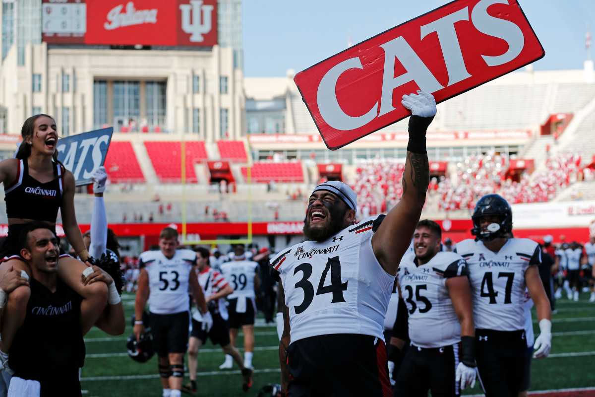 Cincinnati Bearcats defensive lineman Justin Wodtly (34) celebrates the Bearcats win after the fourth quarter of the NCAA football game between the Indiana Hoosiers and the Cincinnati Bearcats at Memorial Stadium in Bloomington, Ind., on Saturday, Sept. 18, 2021. The Bearcats won 38-24. Cincinnati Bearcats At Indiana Hoosiers Football