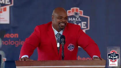 FOXBOROUGH, MA - SEPTEMBER 24: New England Patriots nose tackle Vince  Wilfork waves to the crowd during his induction into the New England Patriots  Hall of Fame presented by Raytheon Technologies on