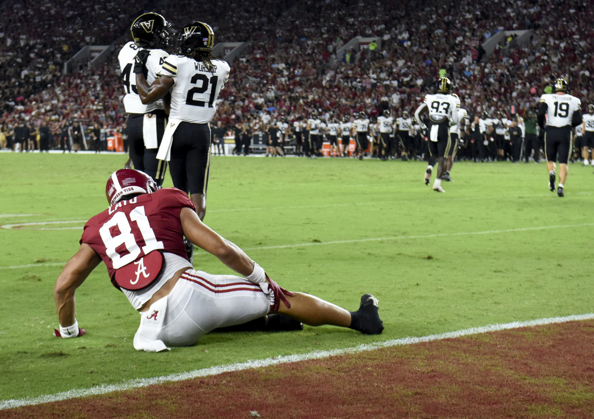 Alabama Crimson Tide tight end Cameron Latu (81) reacts after suffering an apparent injury against the Vanderbilt Commodores at Bryant-Denny Stadium.