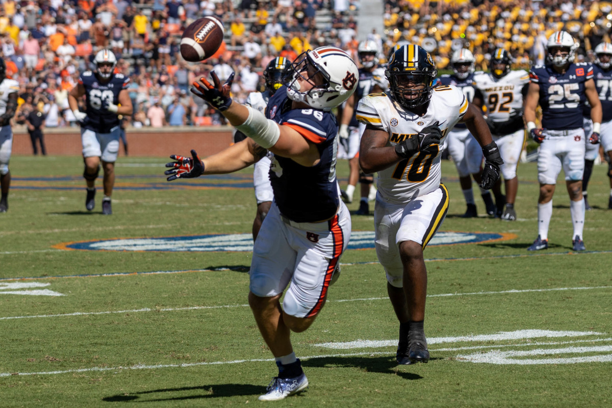 Luke Deal dives for an incomplete pass vs Missouri.