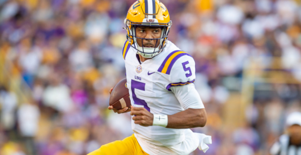 LSU Tigers quarterback Jayden Daniels during a play in a college football game in the SEC.