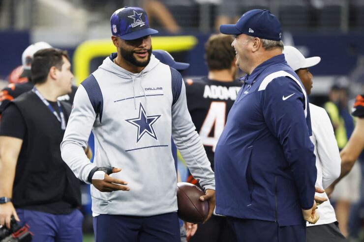 Dak Prescott arriving in DC rocking his cream knit leather bomber jacket  with bone leather accents for Week 18, capping off his most…