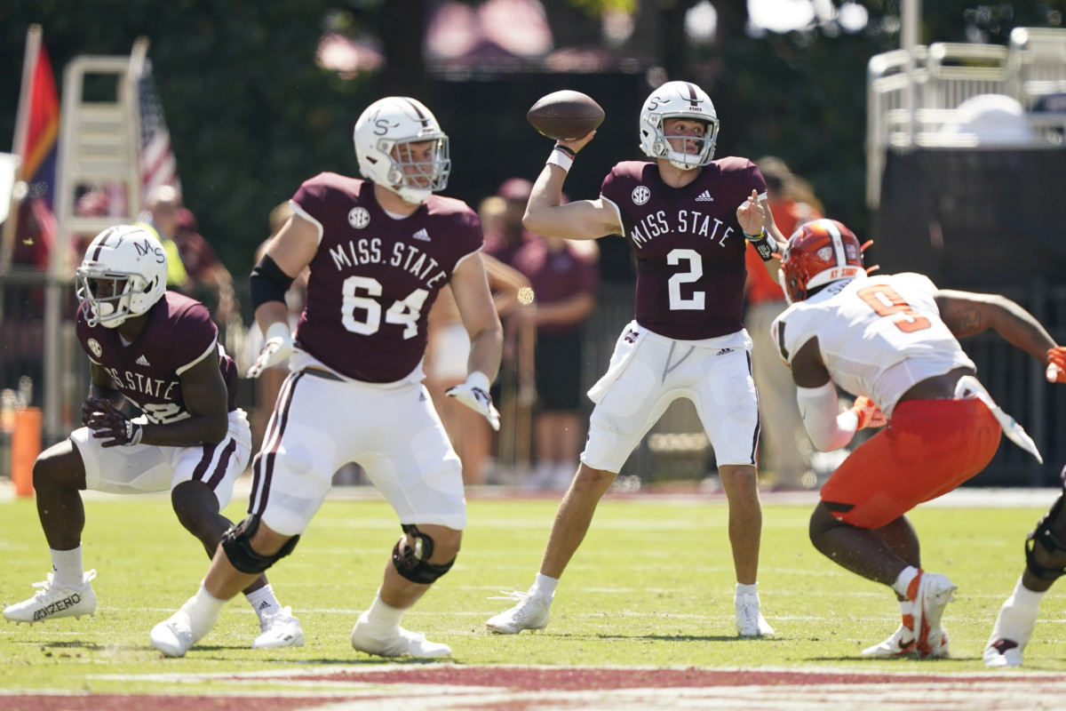 Mississippi State quarterback Will Rogers (2) sets up to pass while Bowling Green linebacker Blaine Spires (9) attempts to pressure him during the first half of an NCAA college football game in Starkville, Miss., Saturday, Sept. 24, 2022. Mississippi State won 45-14. (AP Photo/Rogelio V. Solis)