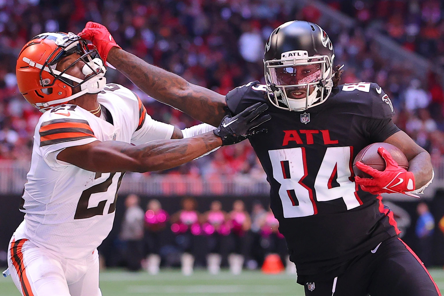 Cordarrelle Patterson of the Atlanta Falcons holds a sign from a