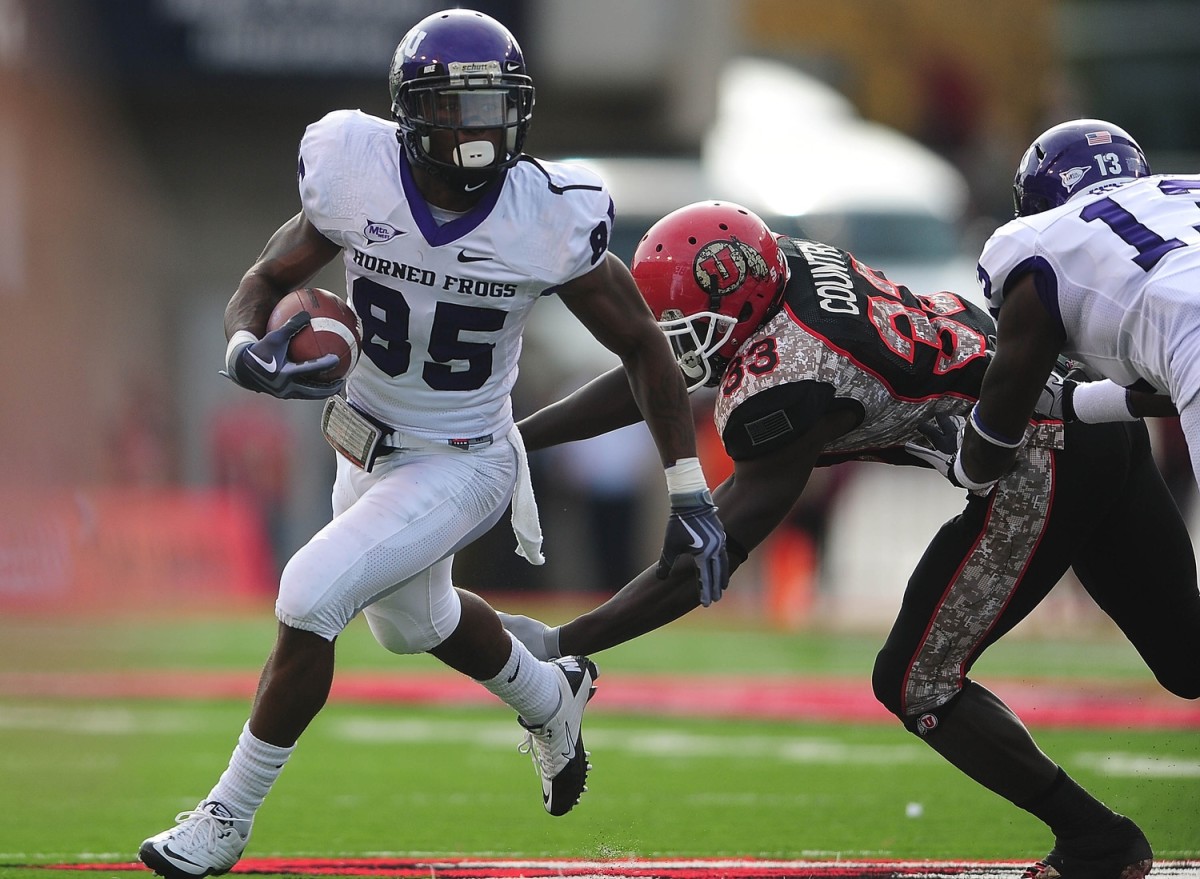 Nov. 6, 2010; Salt Lake City, UT, USA; TCU Horned Frogs wide receiver Jeremy Kerley (85) gets away from Utah Utes cornerback Justin Taplin-Ross (33) during the first quarter at Rice-Eccles Stadium.