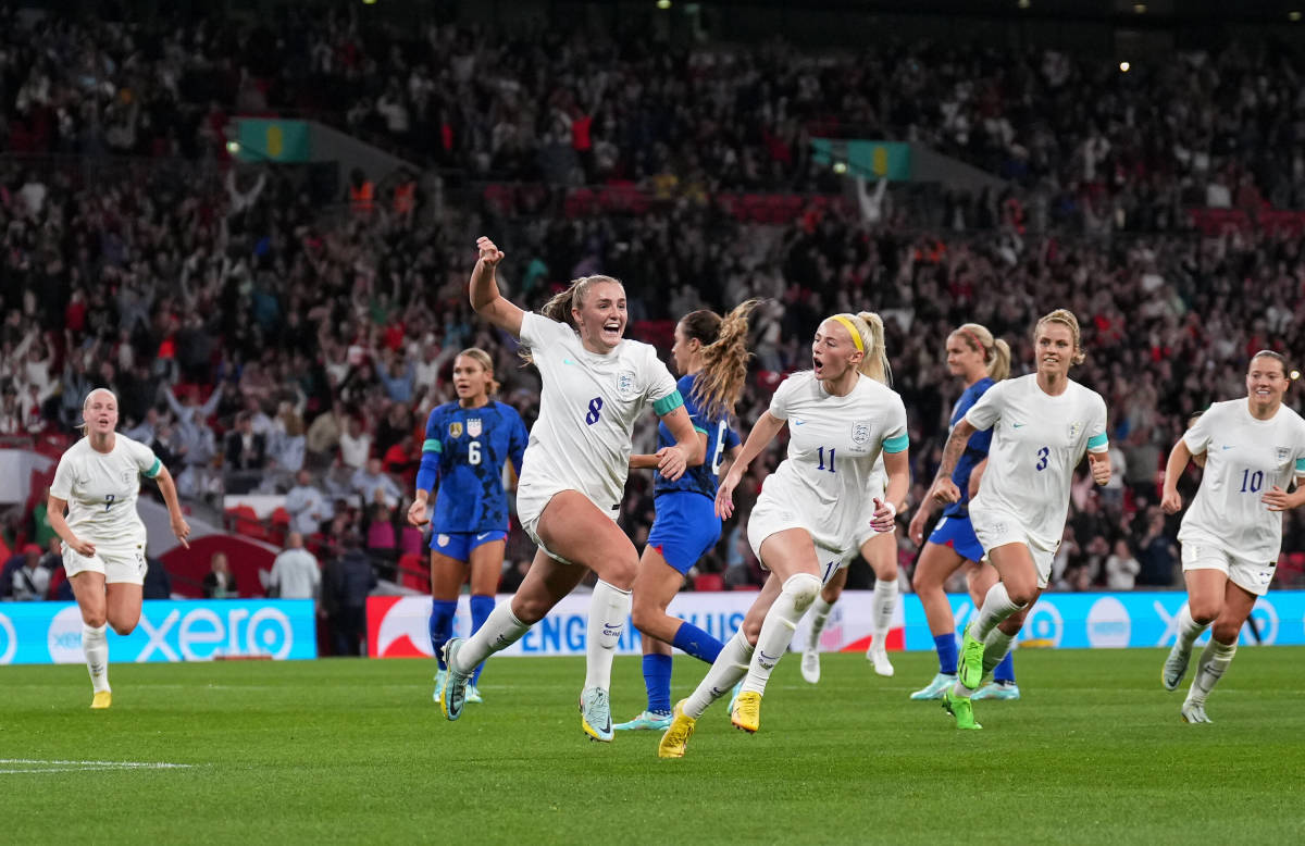 England Women's players pictured celebrating a goal during their 2-1 win over the USWNT at Wembley Stadium in October 2022