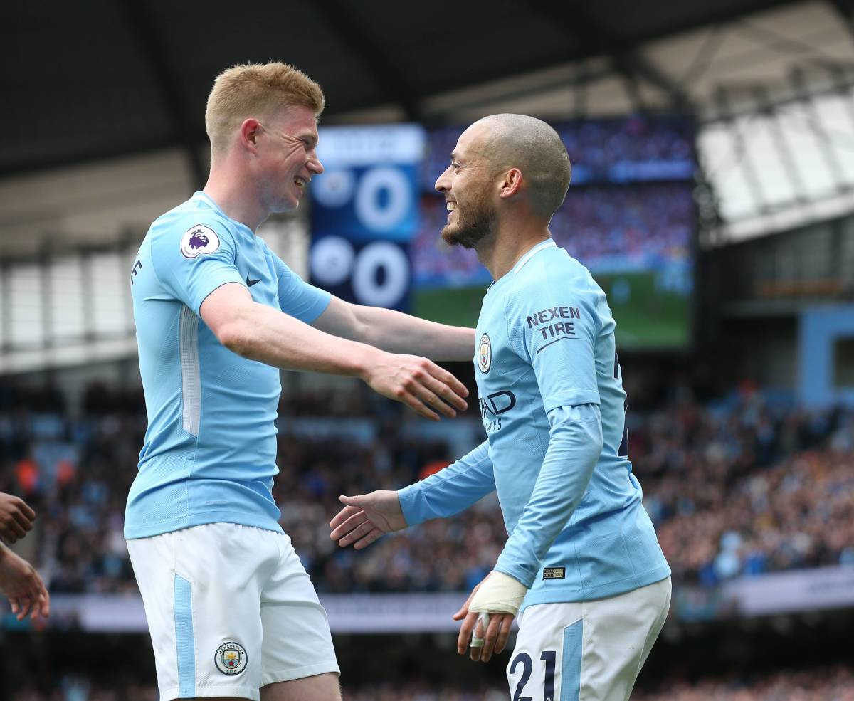 Kevin De Bruyne pictured (left) with David Silva during a Premier League game in 2018