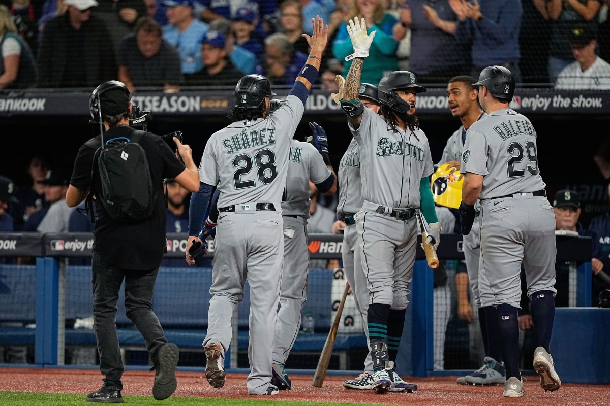 Seattle Mariners' J.P. Crawford follows through on a swing during