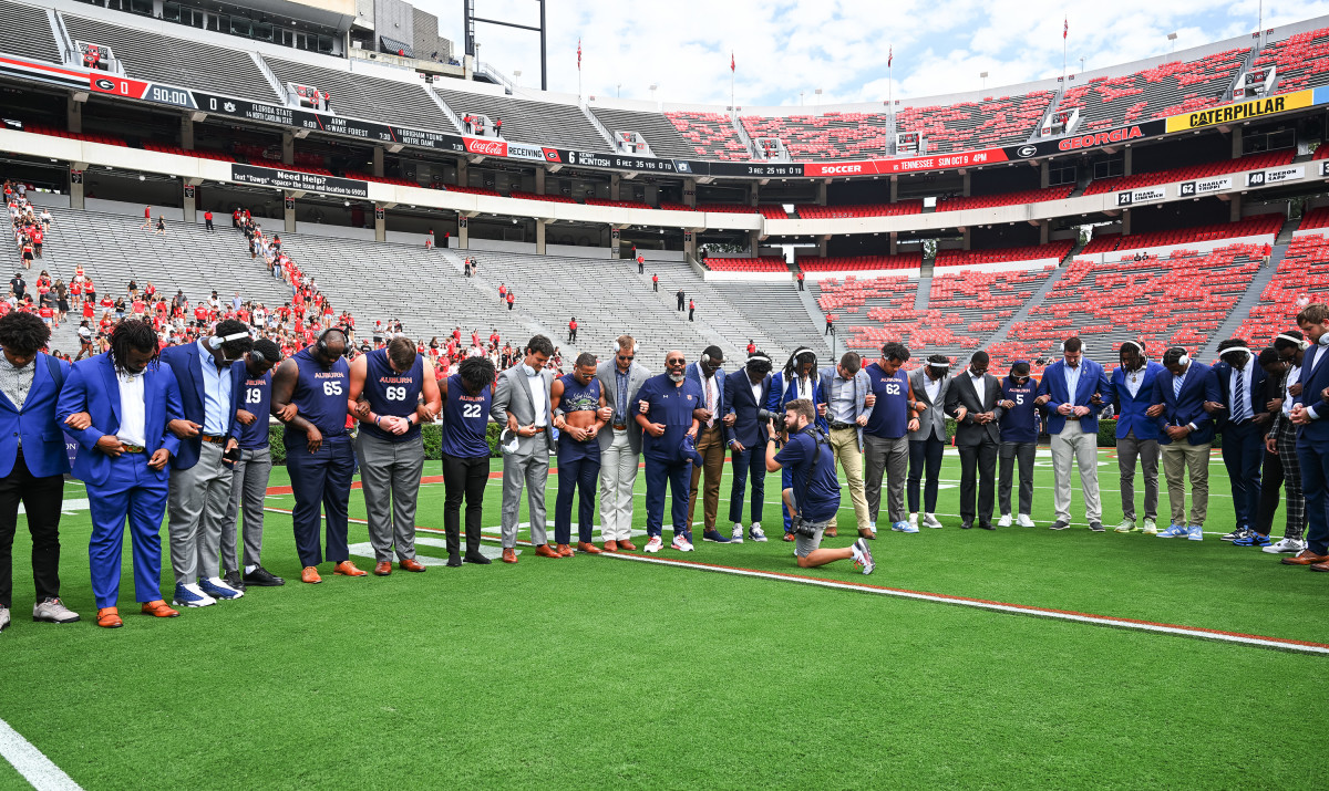 6 Oct 8, 2022; Athens, GA, USA; Team prayer huddle before the game between Auburn and Georgia at Sanford Stadium.Todd Van Emst / AU Athletics