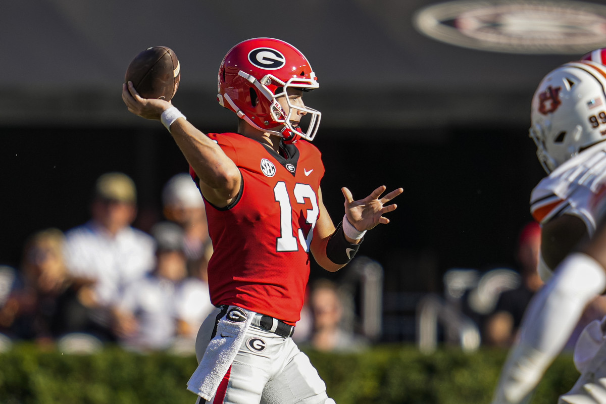 Oct 8, 2022; Athens, Georgia, USA; Georgia Bulldogs quarterback Stetson Bennett (13) passes against the Auburn Tigers at Sanford Stadium. Mandatory Credit: Dale Zanine-USA TODAY Sports