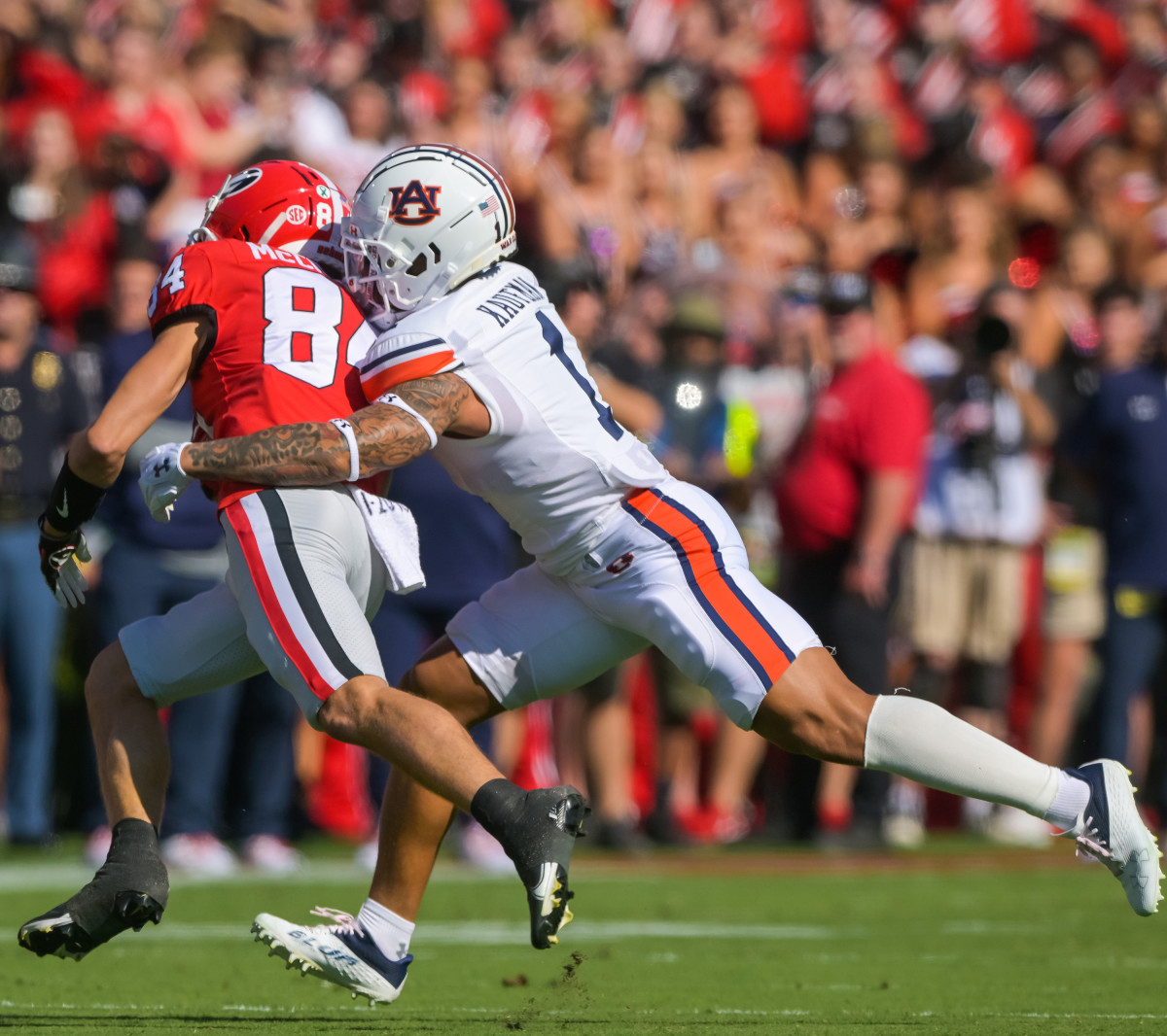 Donovan Kaufman tackles Ladd McConkey.