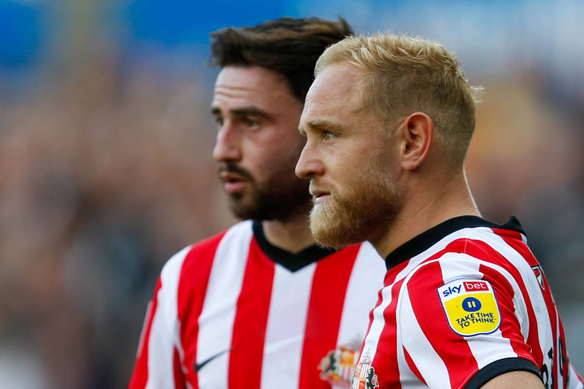 Alex Pritchard and Patrick Roberts look on for Sunderland