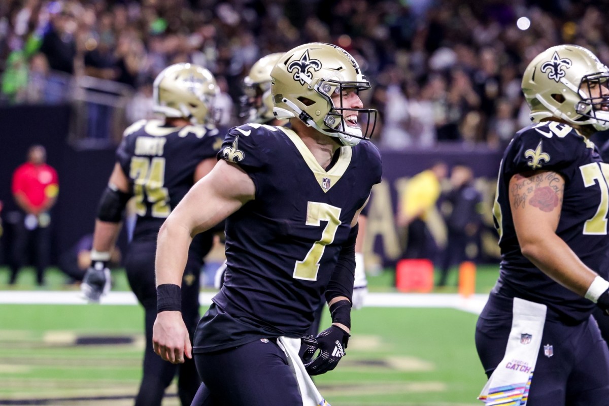 New Orleans Saints tight end Taysom Hill (7) celebrates a touchdown with tight end Adam Trautman (82) against the Seattle Seahawks. Mandatory Credit: Stephen Lew-USA TODAY