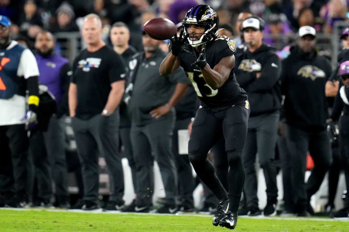 Thursday, November 11, 2021; Miami Gardens, FL USA; Baltimore Ravens wide  receiver Devin Duvernay (13) runs with the ball during an NFL game against  the Miami Dolphins at Hard Rock Stadium. The