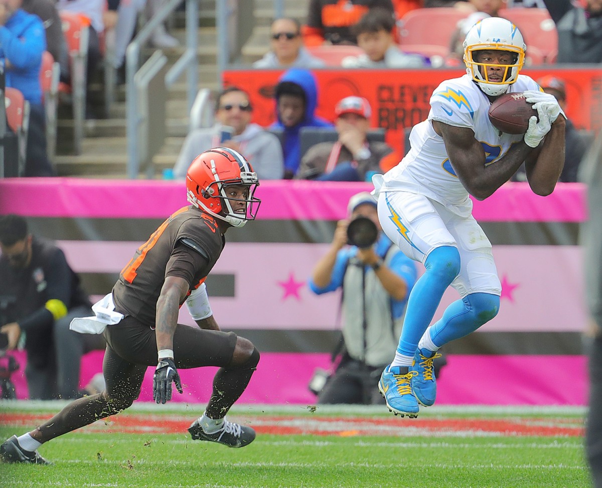 Chargers receiver Mike Williams hauls in a third-quarter pass in front of Browns cornerback Denzel Ward on Sunday, Oct. 9, 2022 in Cleveland. Akr 10 9 Browns Chargers 13