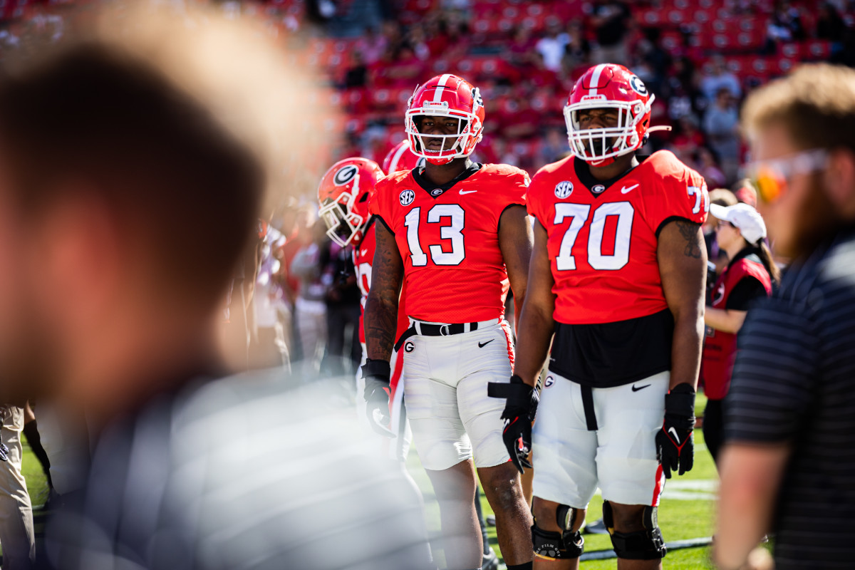 DE, Mykel Williams & OT Warren McClendon