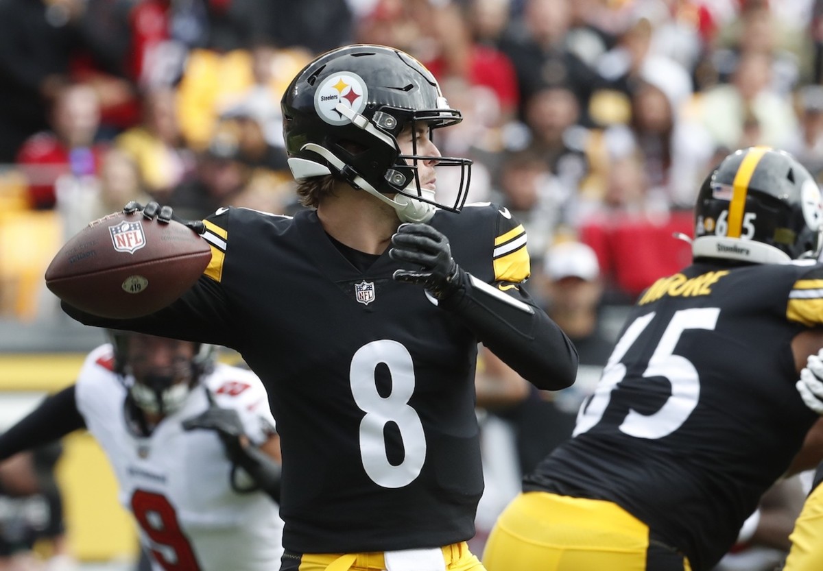 Pittsburgh Steelers quarterback Kenny Pickett rolls out against the Tampa  Bay Buccaneers during an NFL football game at Acrisure Stadium, Sunday,  Oct. 16, 2022 in Pittsburgh. (Winslow Townson/AP Images for Panini Stock