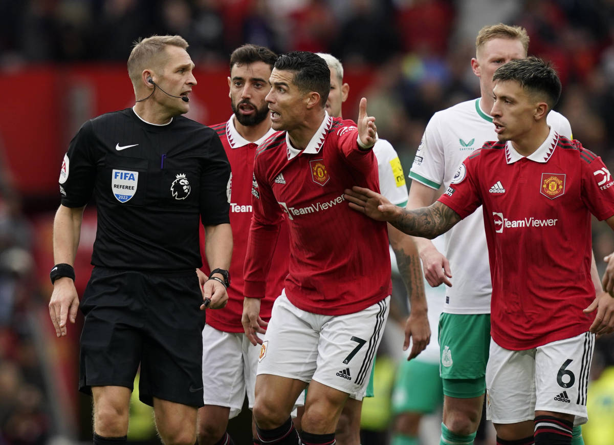 Cristiano Ronaldo (center) pictured pleading with referee Craig Pawson (left) after having a goal disallowed during Manchester United's 0-0 draw with Newcastle in October 2022