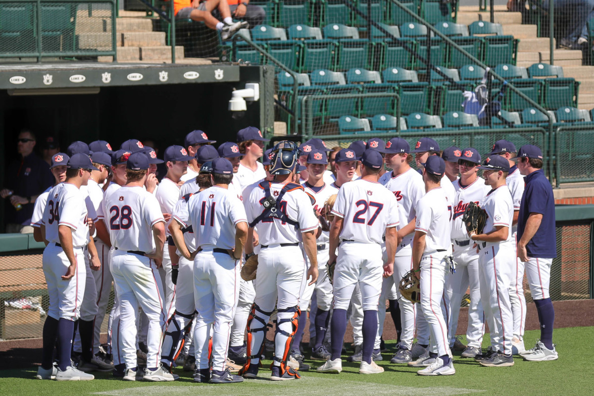 Auburn baseball huddles on the field before fall exhibition action against Louisiana Tech