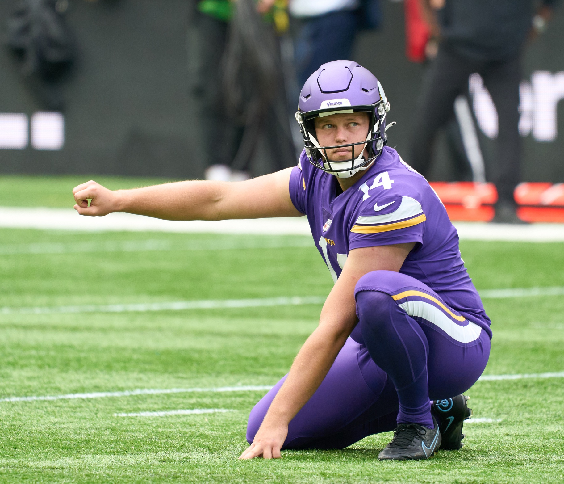 Minnesota Vikings punter Ryan Wright (14) punts against the Detroit Lions  during an NFL football game, Sunday, Dec. 11, 2022, in Detroit. (AP  Photo/Rick Osentoski Stock Photo - Alamy