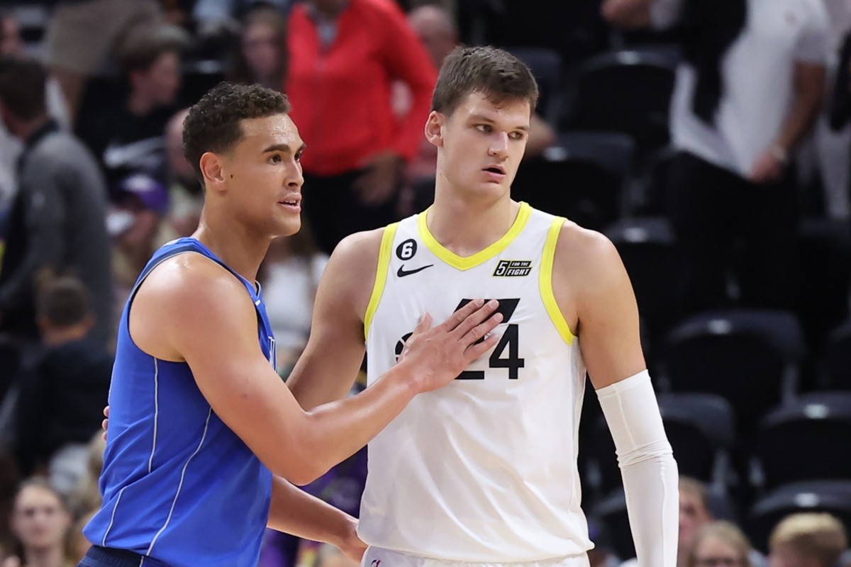 Dallas Mavericks center Dwight Powell (7) and Utah Jazz center Walker Kessler (24) exchange well wishes after their game at Vivint Arena.