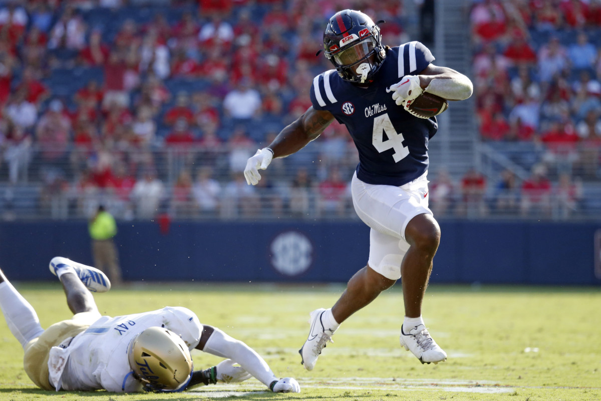 Mississippi Rebels running back Quinshon Judkins (4) breaks a tackle during the second half against the Tulsa Golden Hurricane at Vaught-Hemingway Stadium.