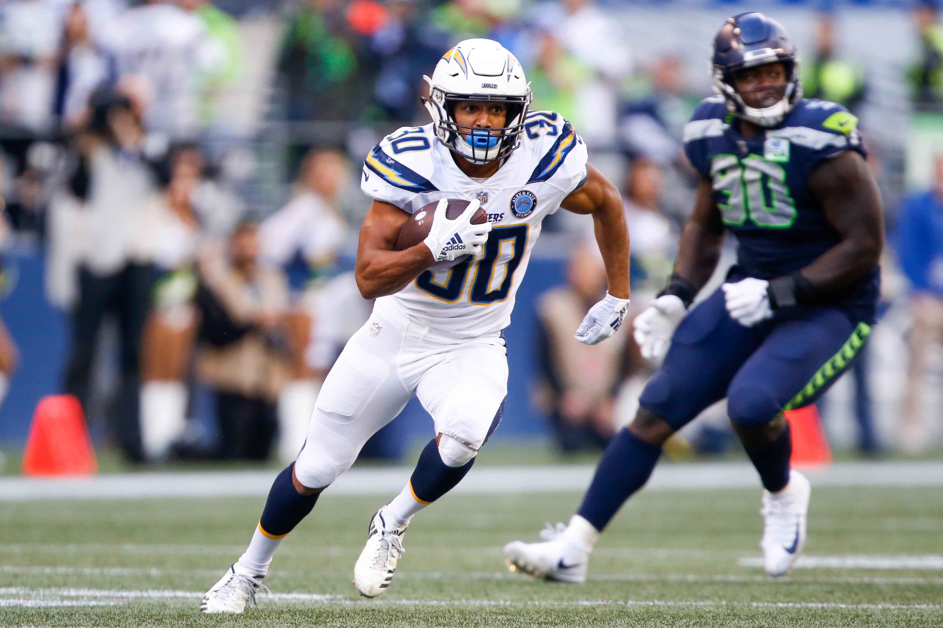 Photo: Los Angeles Chargers running back Austin Ekeler (30) fumbles caused  by Seattle Seahawks linebacker Jordyn Brooks - LAP2022102309 