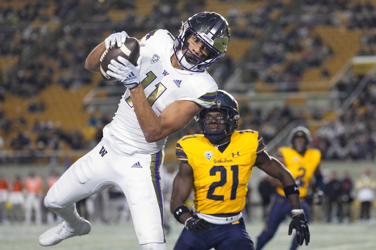 Jalen McMillan beats Cal nickelback Collin Gamble to the ball.